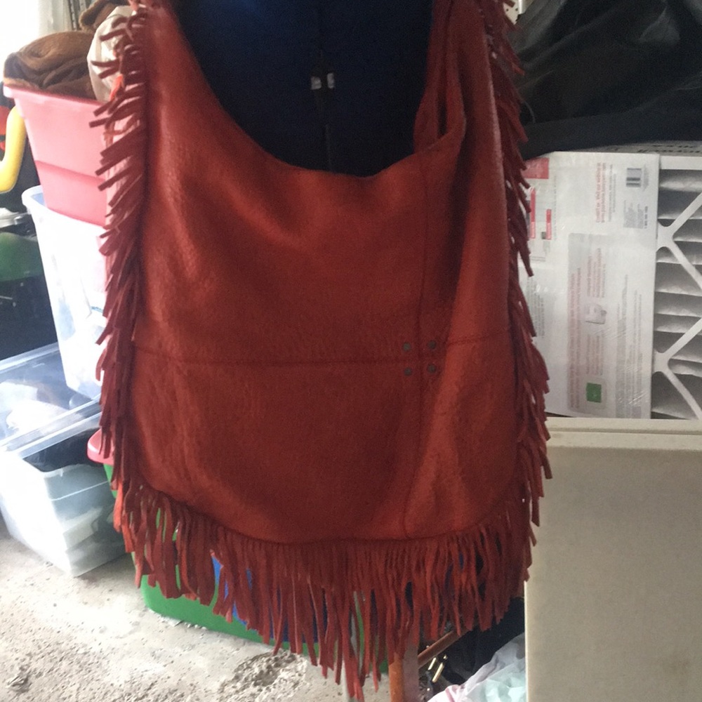Red leather fringe shoulder bag from Anthropologie